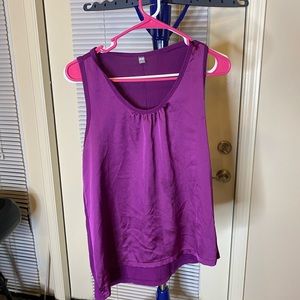 Basic purple top, wrinkles remove easy with steam
